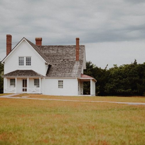 Picture of a house on a field- first priority insurance